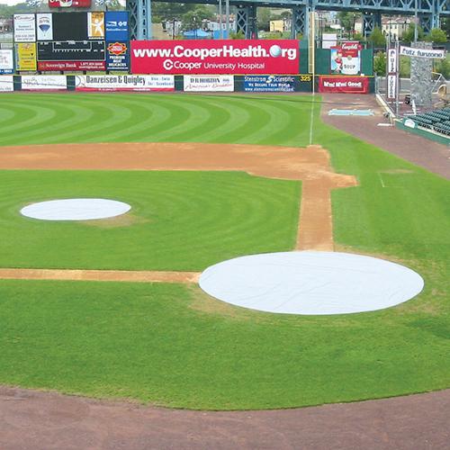 BASEBALL TARP WITH GROUND STAKES (26' ROUND - 6 OZ. POLYETHYLENE) (HOME PLATE) (WHITE OR SILVER - REVERSIBLE)